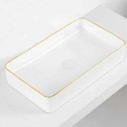 Vasque à Poser 60x35 Cm, En Céramique, Blanc Et Liseré Doré - Chic Gold 9 Vasque à Poser 60x35 Cm, En Céramique, Blanc Et Liseré Doré - Chic Gold -Produits De Salle De Bain Soldes 2024 vasque a poser en ceramique blanc et lisere dore 60x35 cm chic gold 2